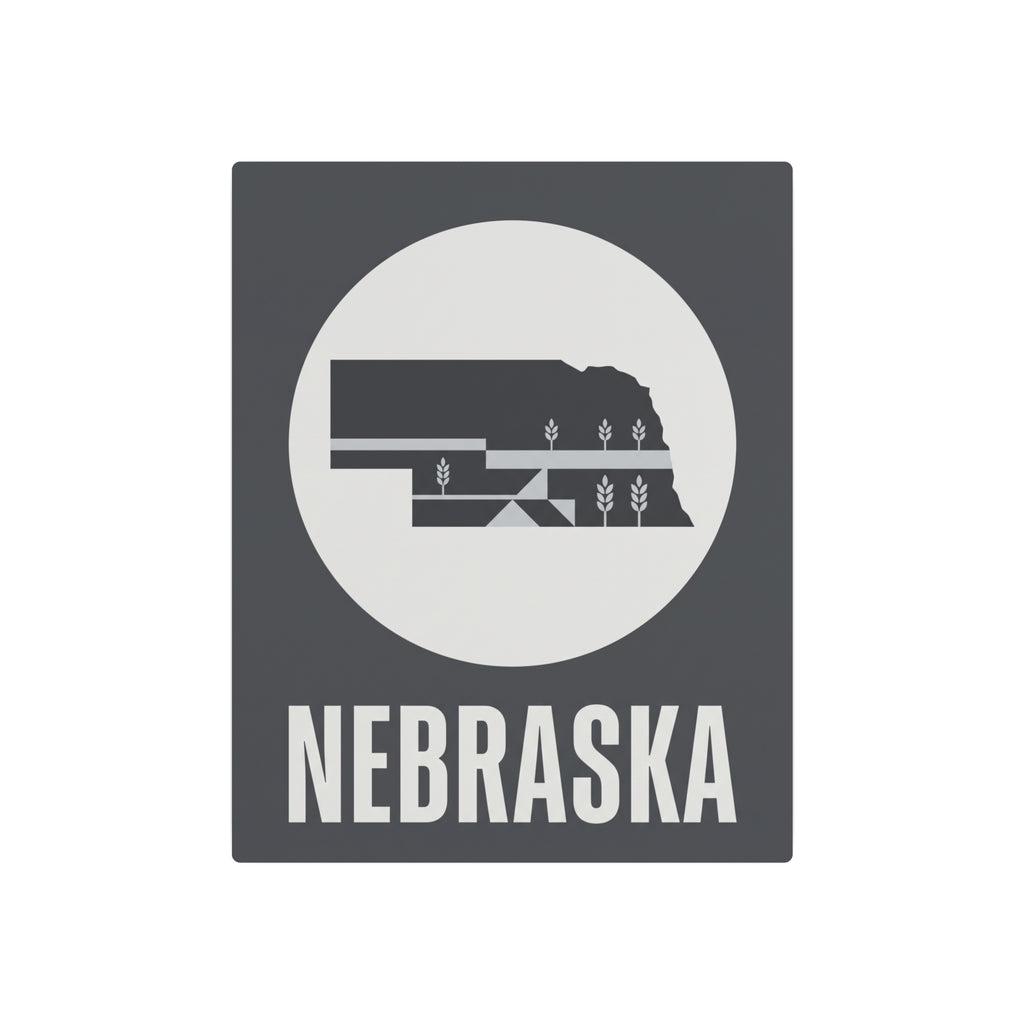 Nebraska metal art sign with dark square frame, centered circular wheat graphic, and NEBRASKA