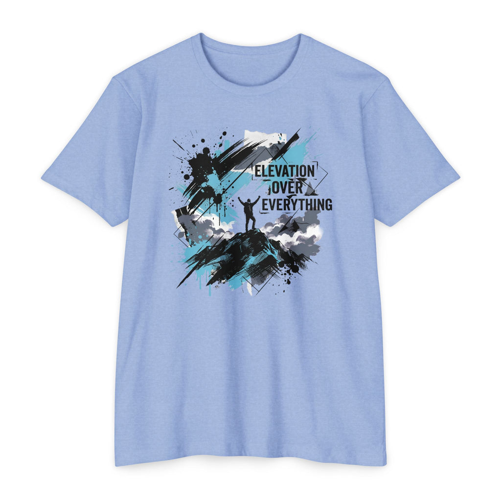 Light blue crewneck T-shirt with blue/black splatter mountain graphic and text "ELEVATION OVER EVERYTHING"