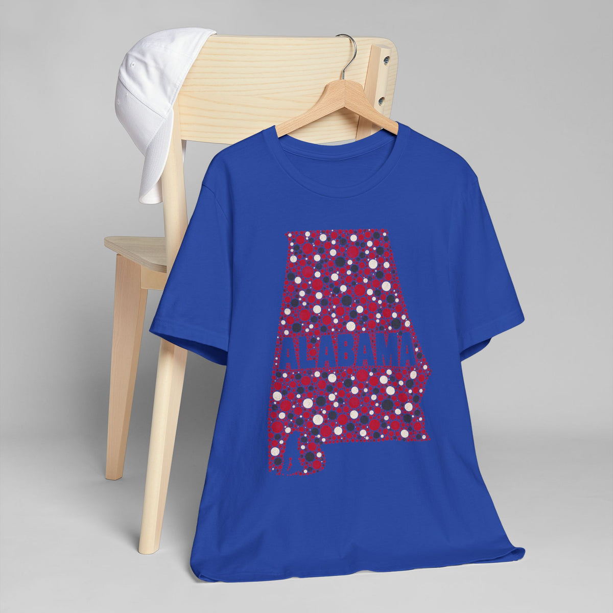 Royal blue short-sleeve T-shirt with red floral Alabama state outline graphic