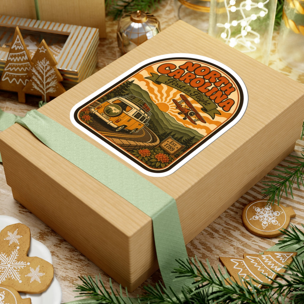 North Carolina vintage van and biplane round sticker on wrapped gift box, die-cut