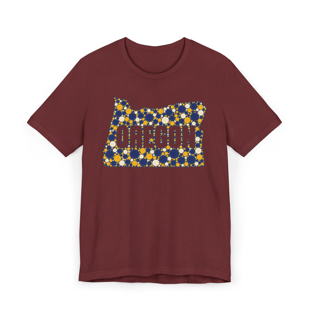 Burgundy t-shirt with Oregon polka dot map graphic in blue and gold on front