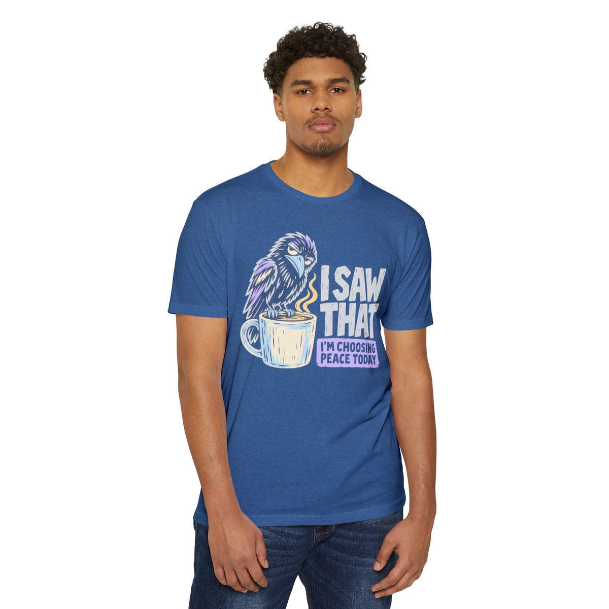 Light blue crewneck T-shirt with colorful raven coffee graphic and 'I saw that' peace slogan