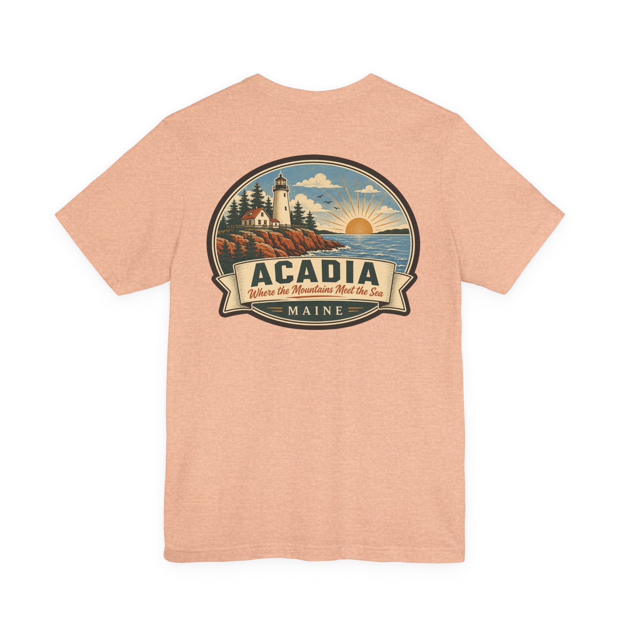 Heather peach crew-neck T-shirt with centered Acadia lighthouse graphic badge