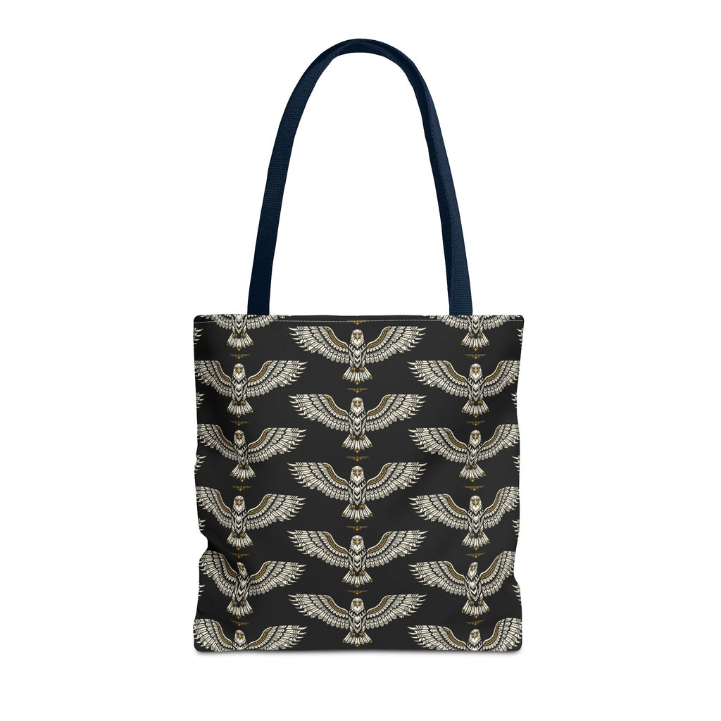 Tote bag featuring winged scarab pattern on black fabric, gold emblems, navy handles