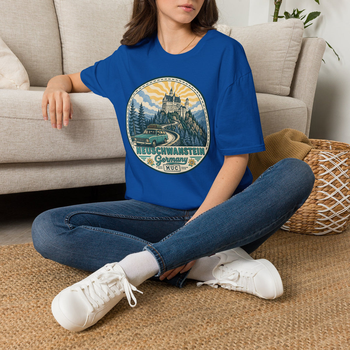 Royal blue T-shirt with round Neuschwanstein castle illustration graphic on the chest