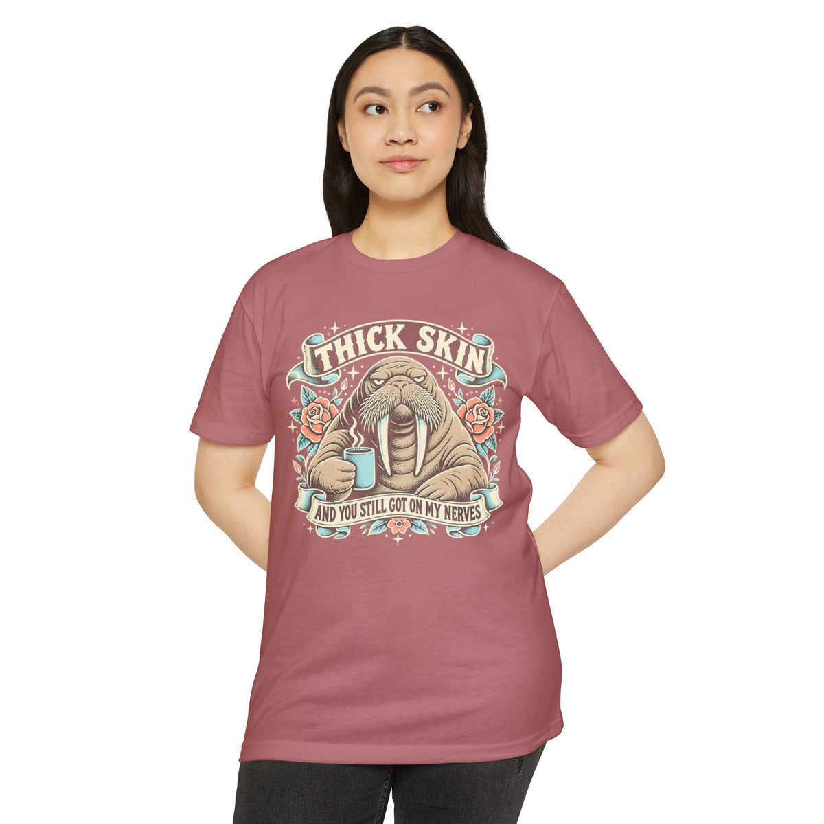 Rose-pink short-sleeve T-shirt with centered walrus coffee graphic on the front