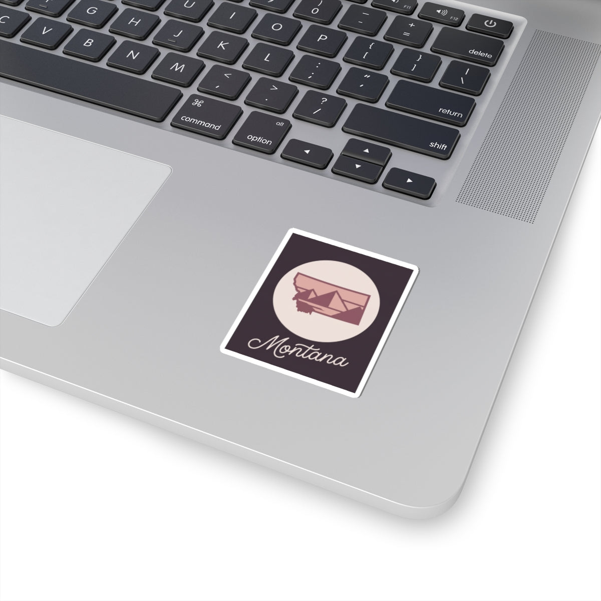 Montana state silhouette kiss-cut decal sticker with “Montana” script under mountain graphic