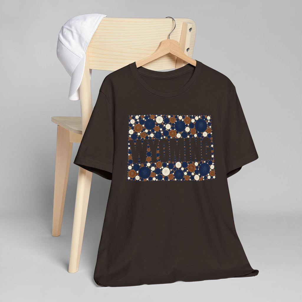 Black crewneck t-shirt with dotted Wyoming map graphic in navy and tan