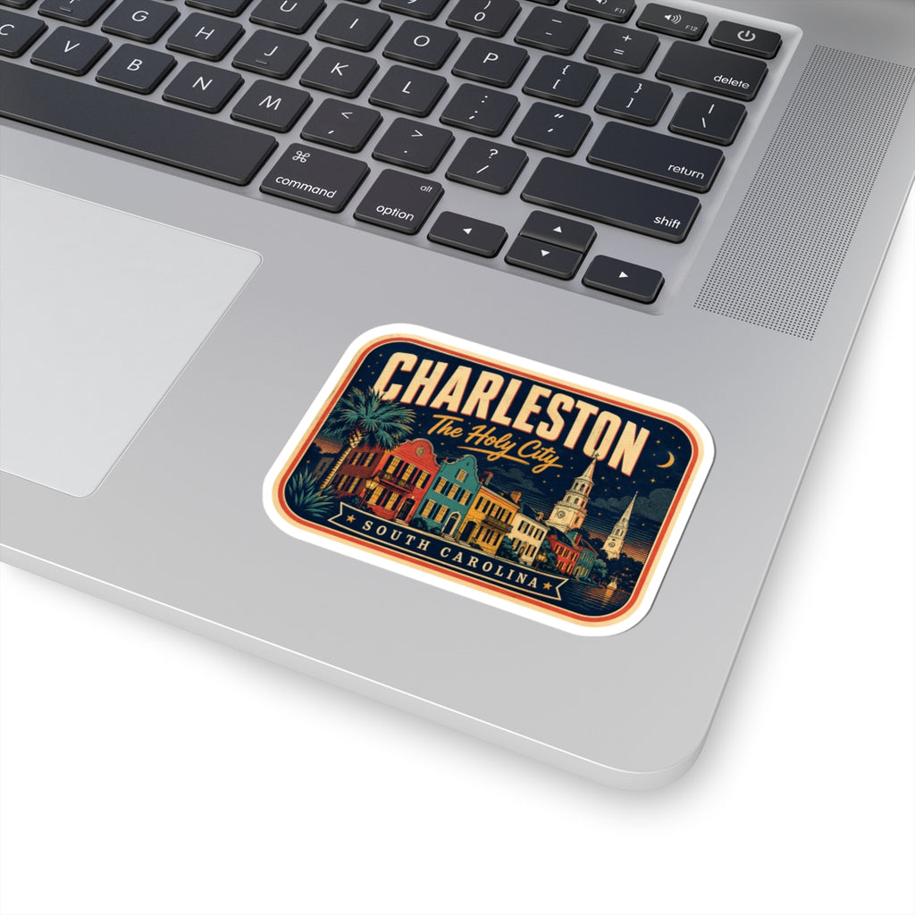 Luggage tag sticker on laptop keyboard, rounded rectangle with Charleston skyline and 'South Carolina'