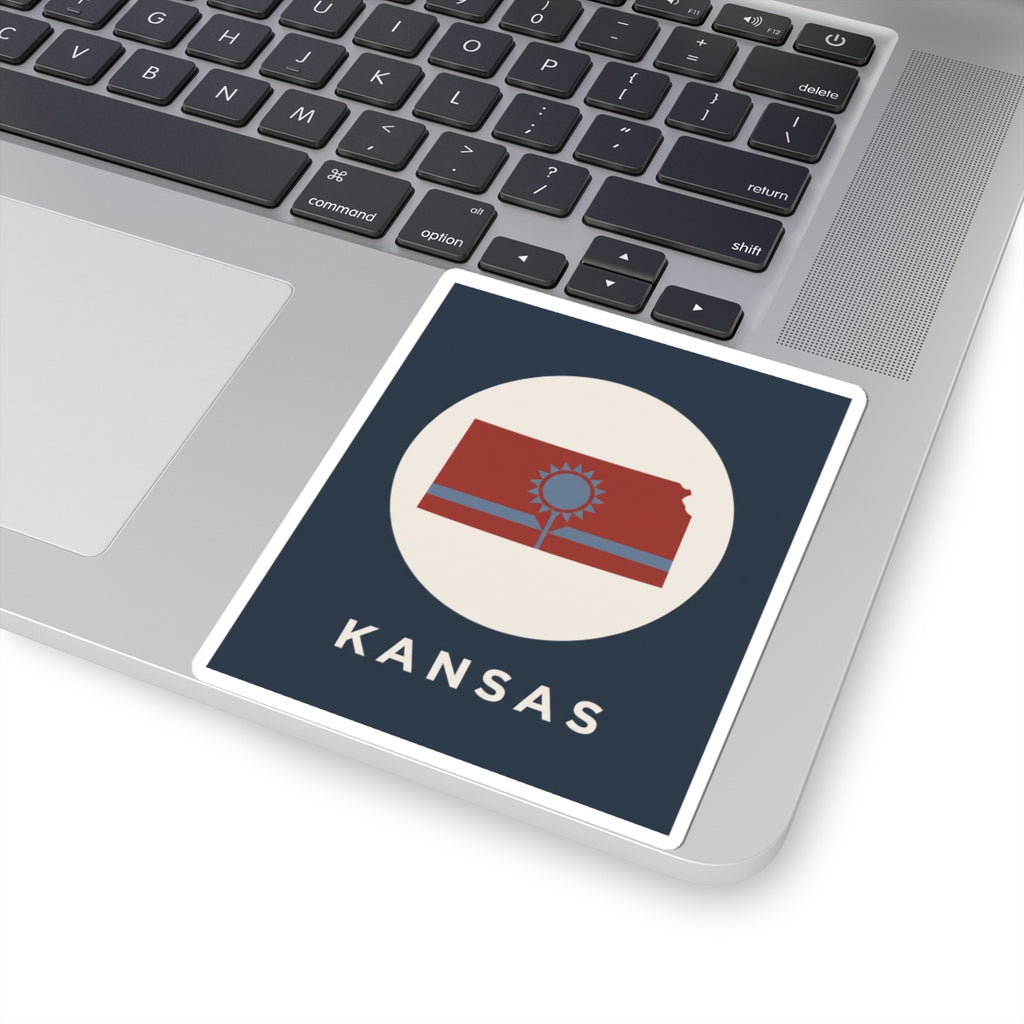 Angled rectangular Kansas sunflower state sticker, blue background, “KANSAS” text