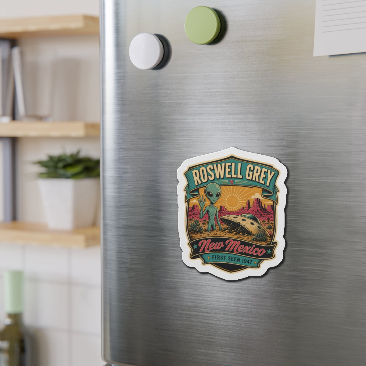 Die-cut refrigerator magnet with “Roswell Grey” alien and New Mexico badge design