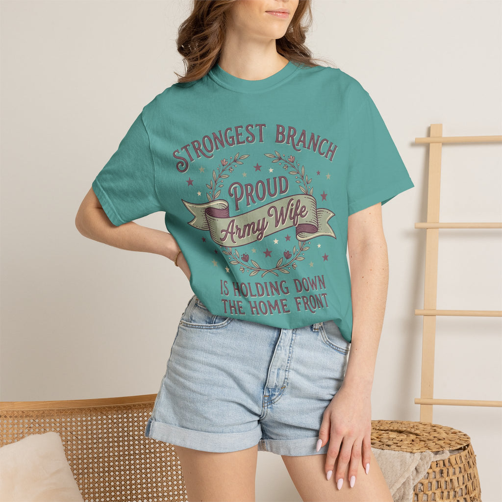 Teal T-shirt worn by a model; wreath graphic with “Proud Army Wife” and star details.