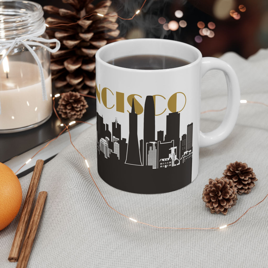 Ceramic mug with 'NCISCO' skyline graphic and gold lettering on black base