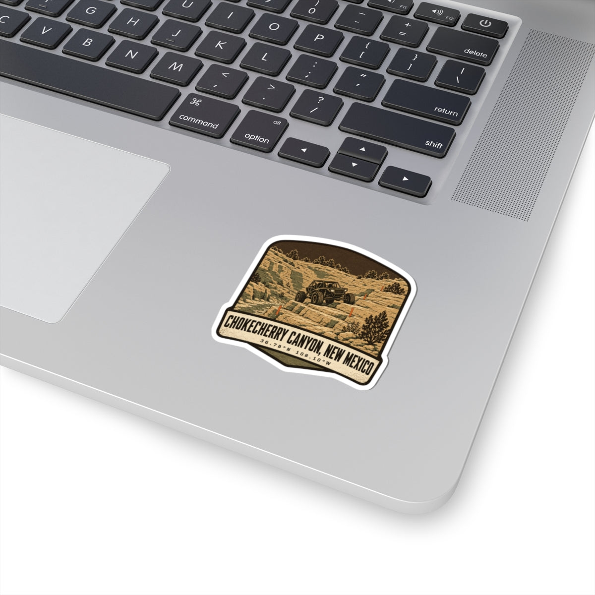 Die-cut sticker: desert canyon landscape with 'Chokecherry Canyon' text, white border