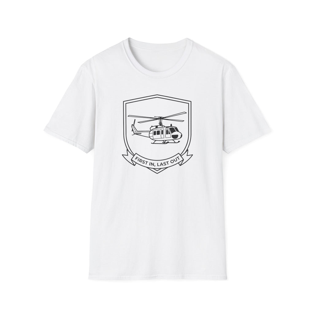 White T-shirt with black helicopter badge graphic and ribbon text “First In, Last Out”.