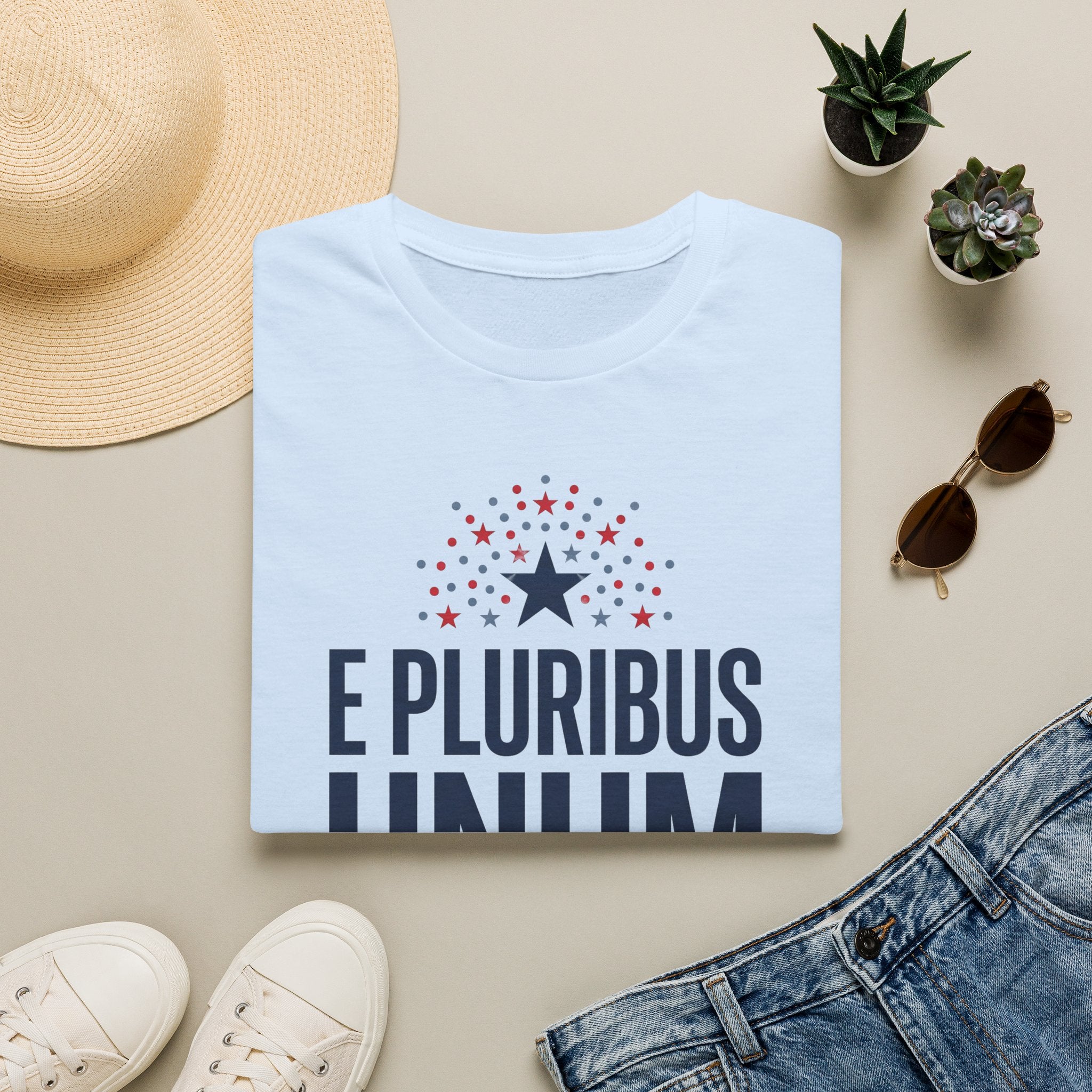 Light blue patriotic T-shirt with crew neck; starburst and 'E Pluribus Unum' lettering