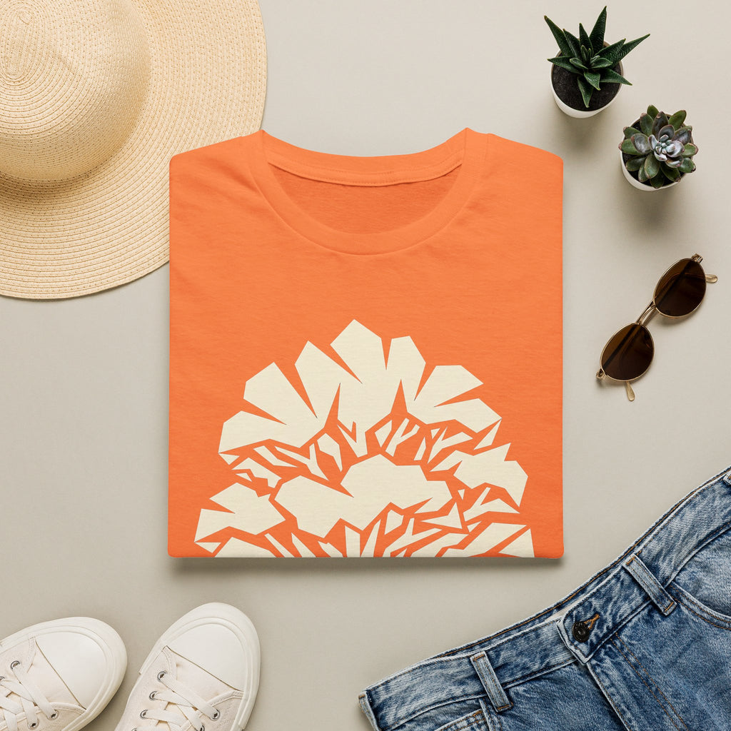 Orange t-shirt with geometric faceted tree silhouette graphic on front.