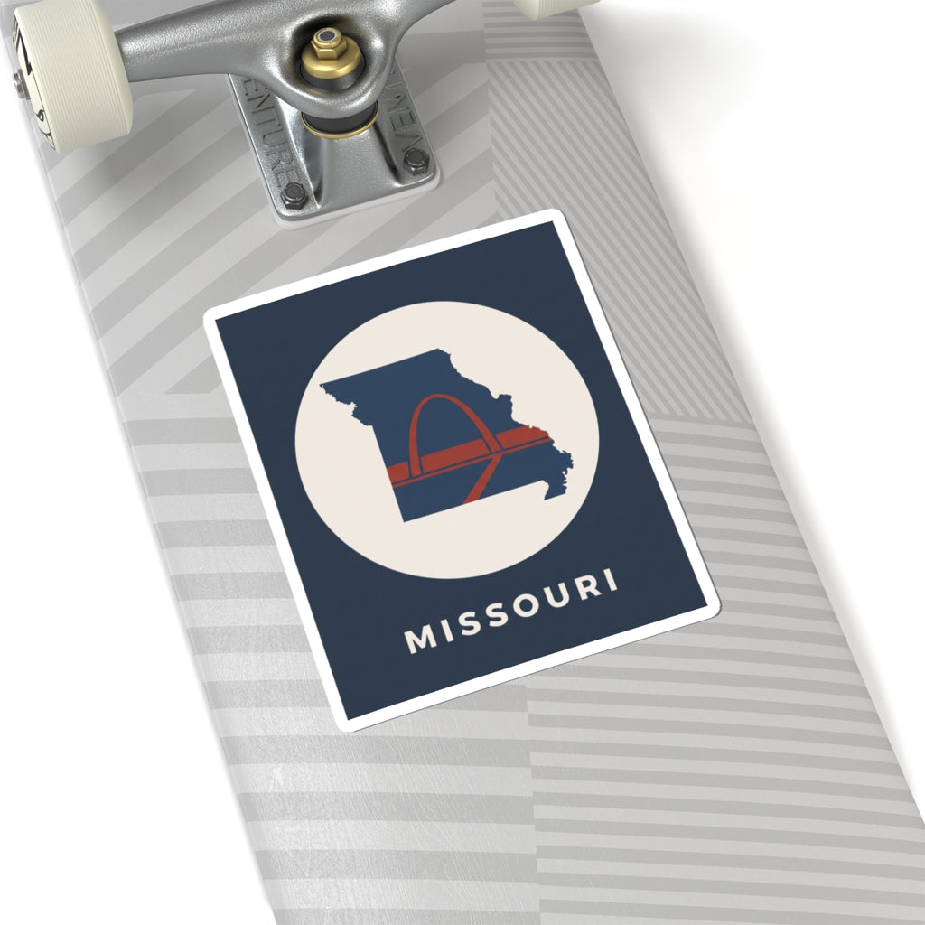 Missouri map and arch illustration sticker with MISSOURI text, on a gray striped surface