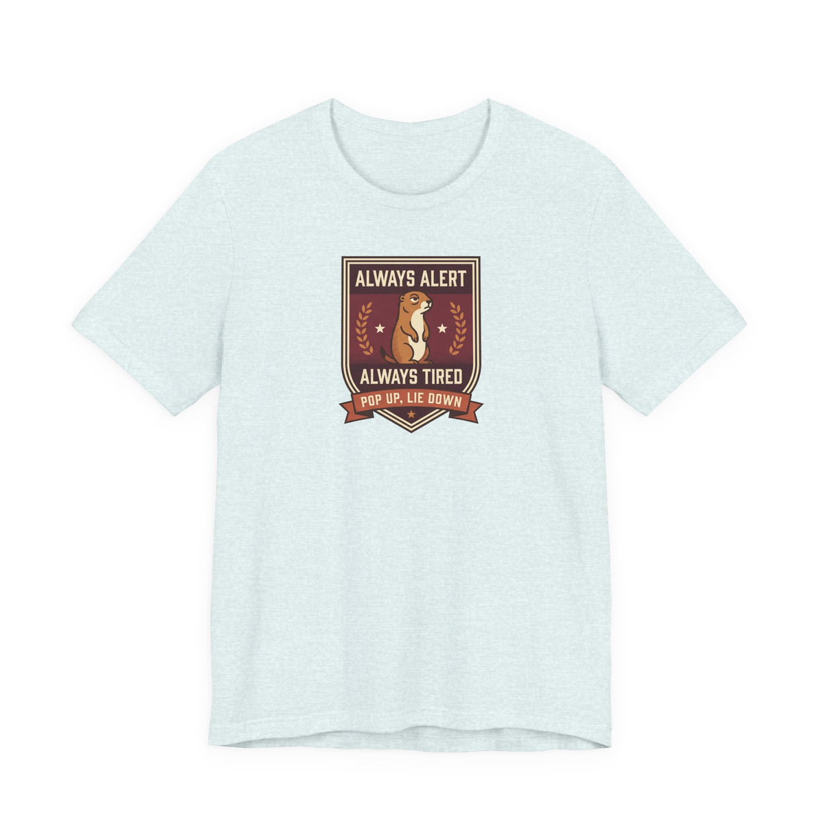 Powder blue T-shirt with squirrel crest badge graphic and “Always Alert Always Tired” text
