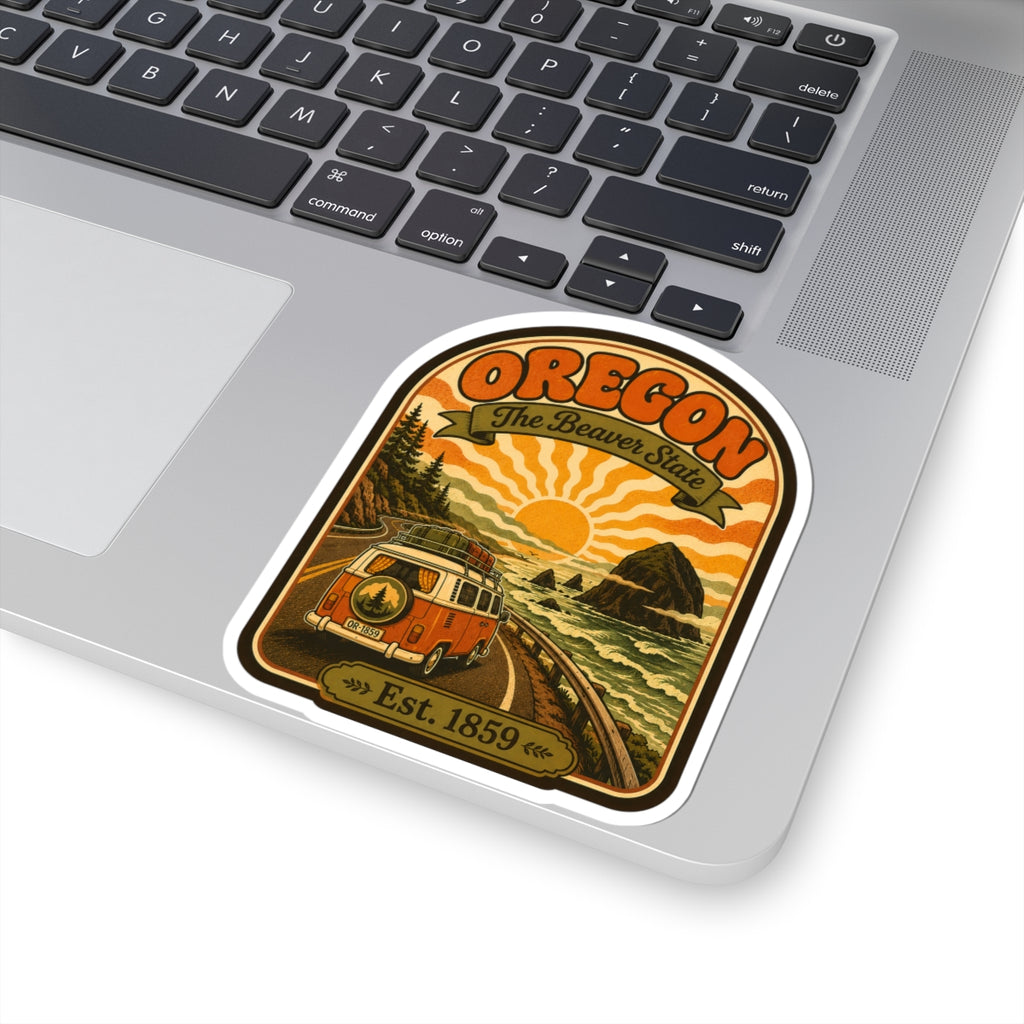 Oregon The Beaver State sticker on a laptop, showing retro van, waves, and Est. 1859
