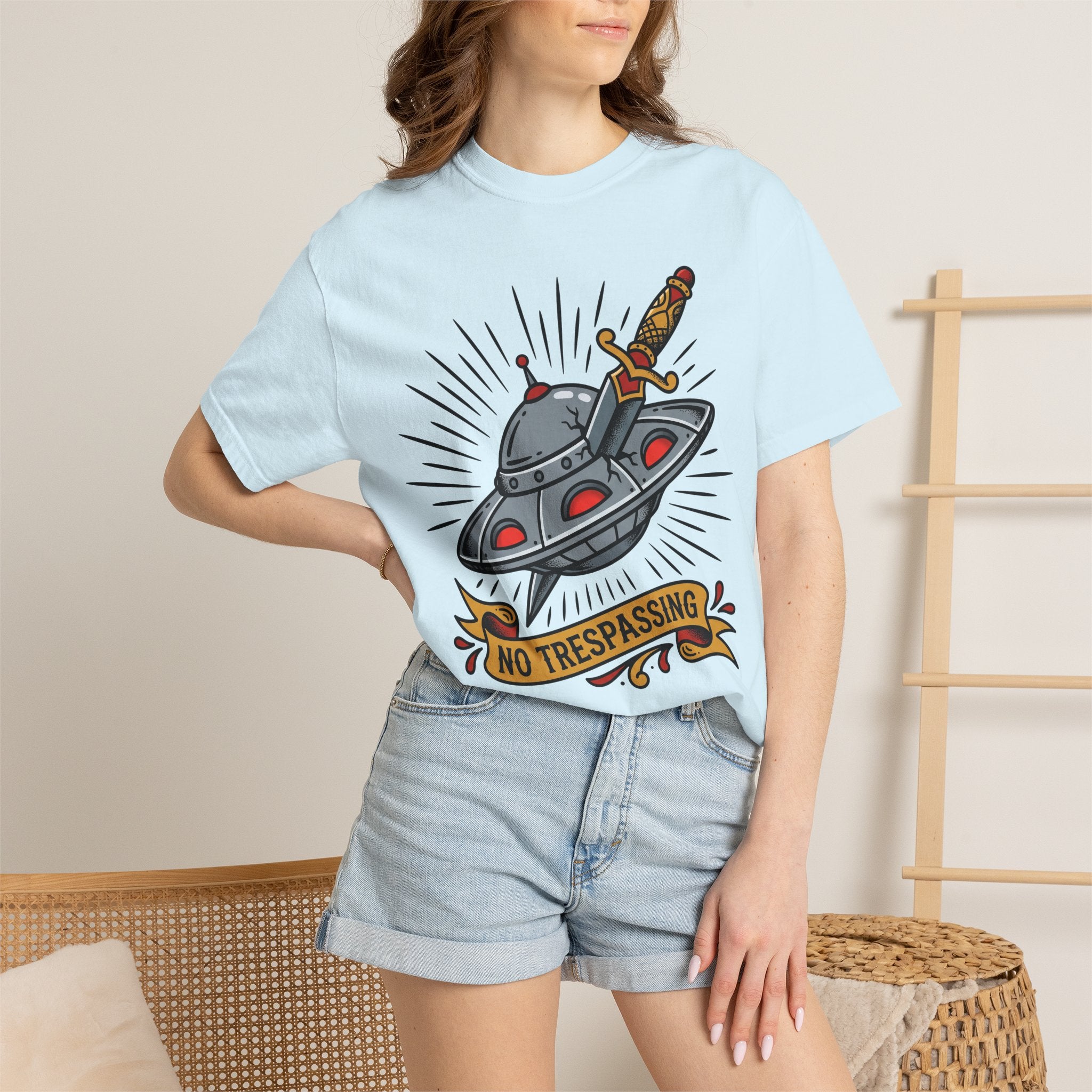 Light blue T-shirt with retro UFO dagger and 'No trespassing' graphic