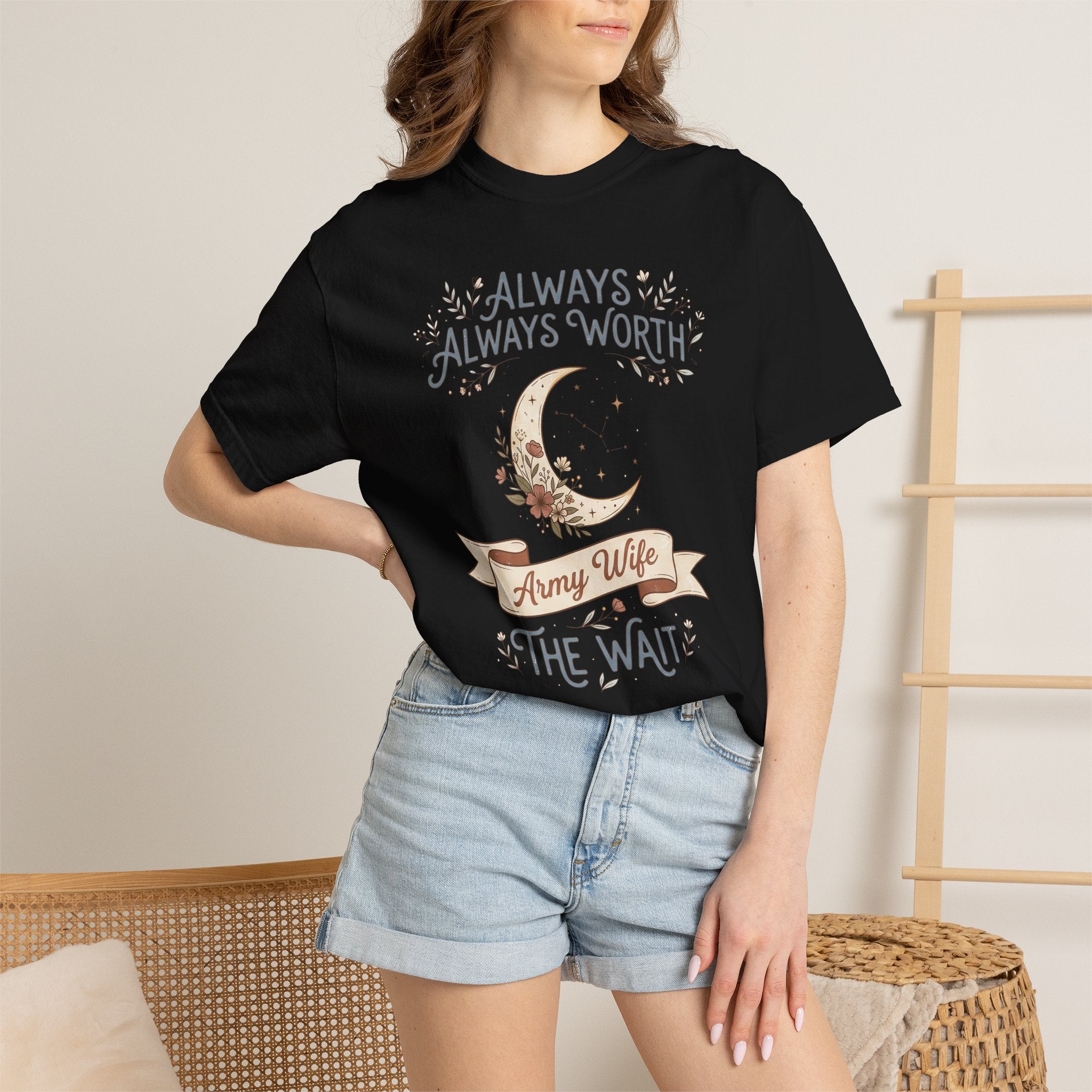 Black T-shirt on model with crescent moon and “ALWAYS WORTH” design
