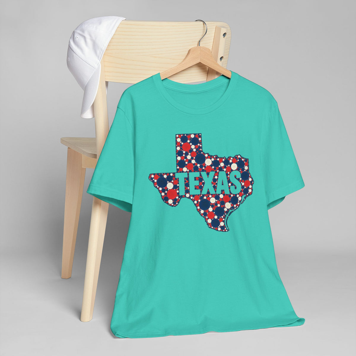 Teal T-shirt with polka-dot Texas graphic and TEXAS lettering
