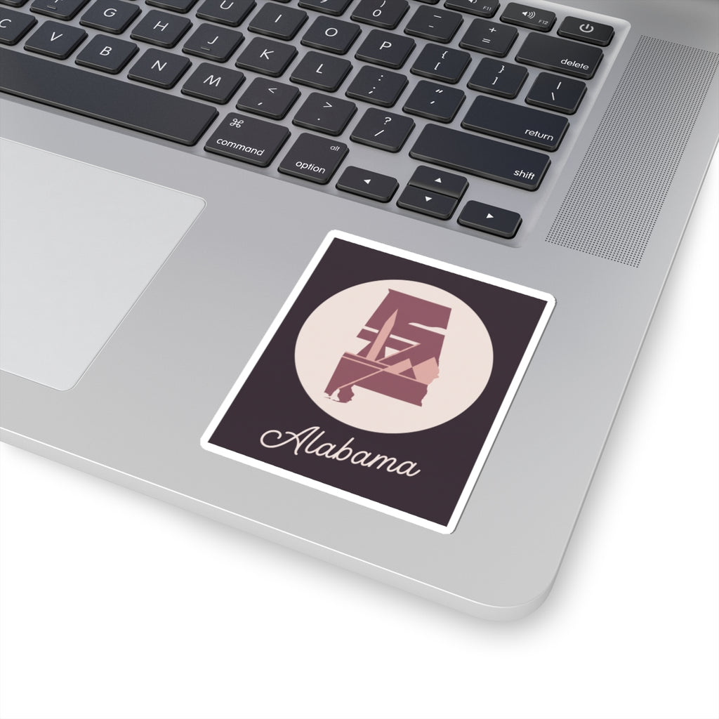 Alabama silhouette vinyl decal with mauve logo, cream circle, and 'Alabama' script, white outline