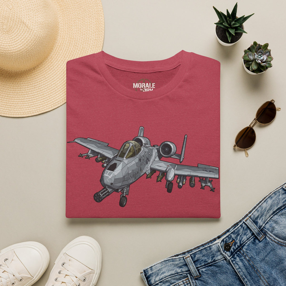Maroon crew-neck t-shirt with gray fighter jet graphic