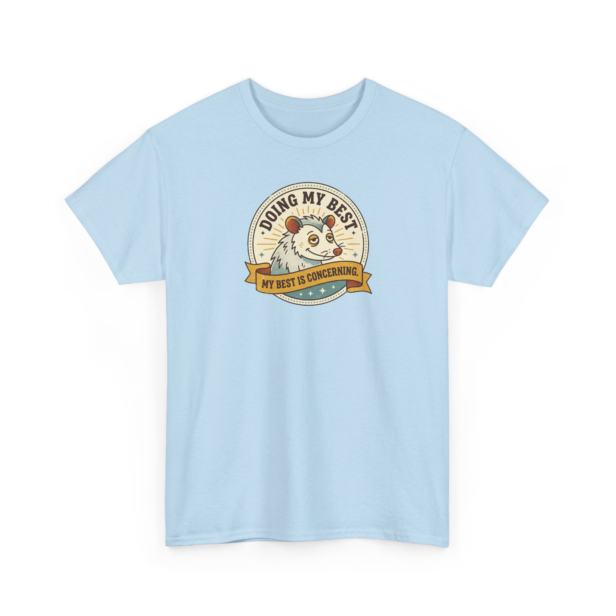 Sloth graphic T-shirt in light blue with a round slogan badge and sloth illustration on the chest