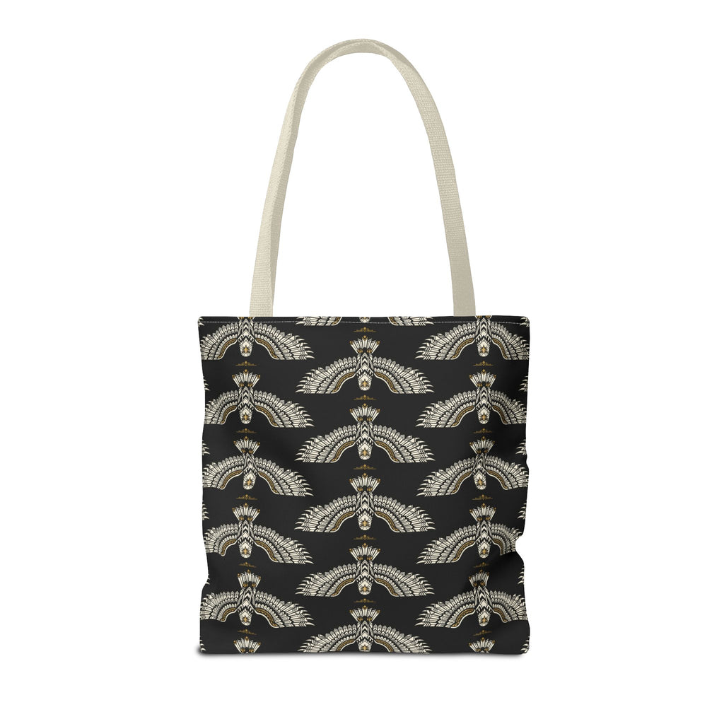 Scarab motif tote bag on white background, black fabric with gold repeating winged designs