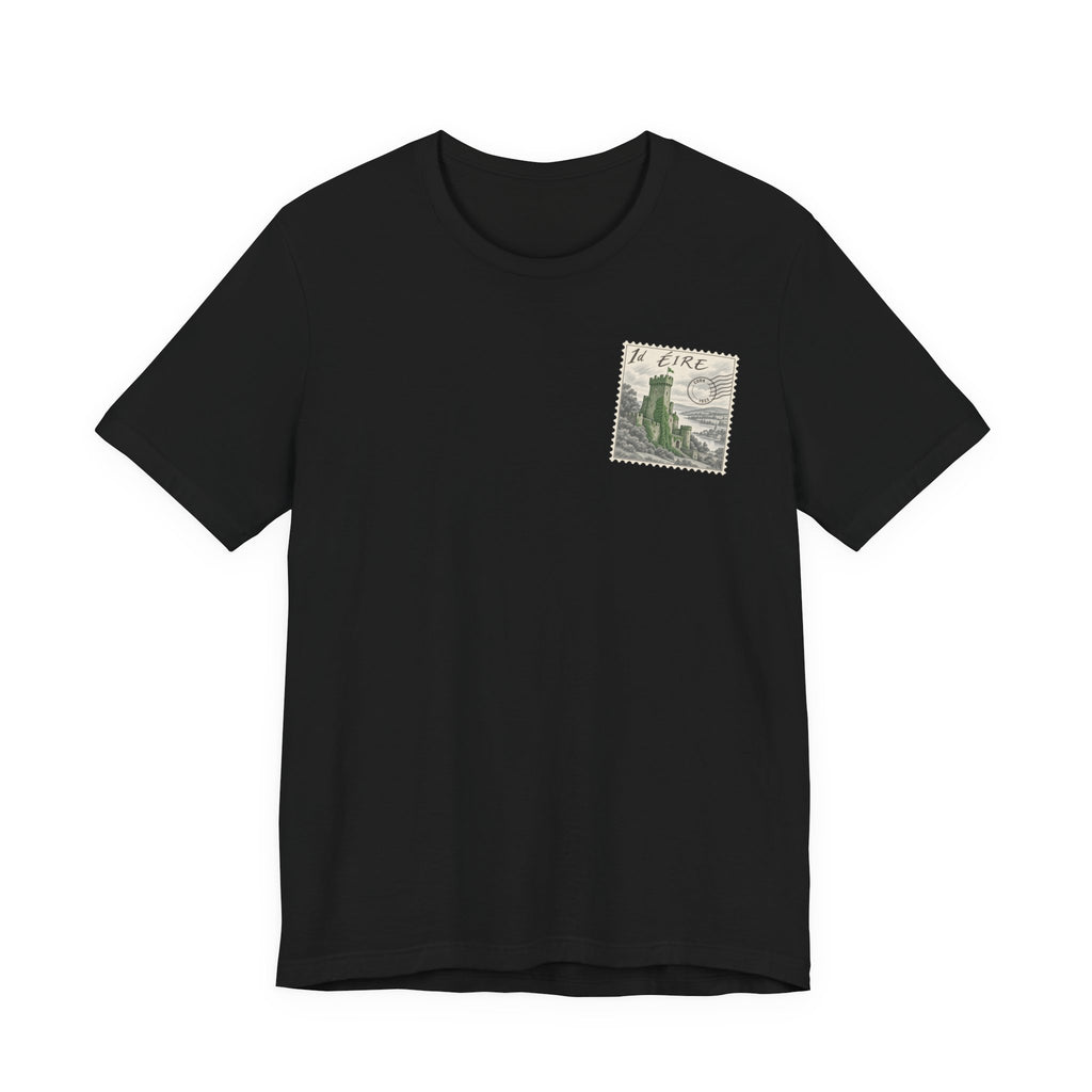 Black travel t-shirt with small vintage postage-stamp castle graphic on chest