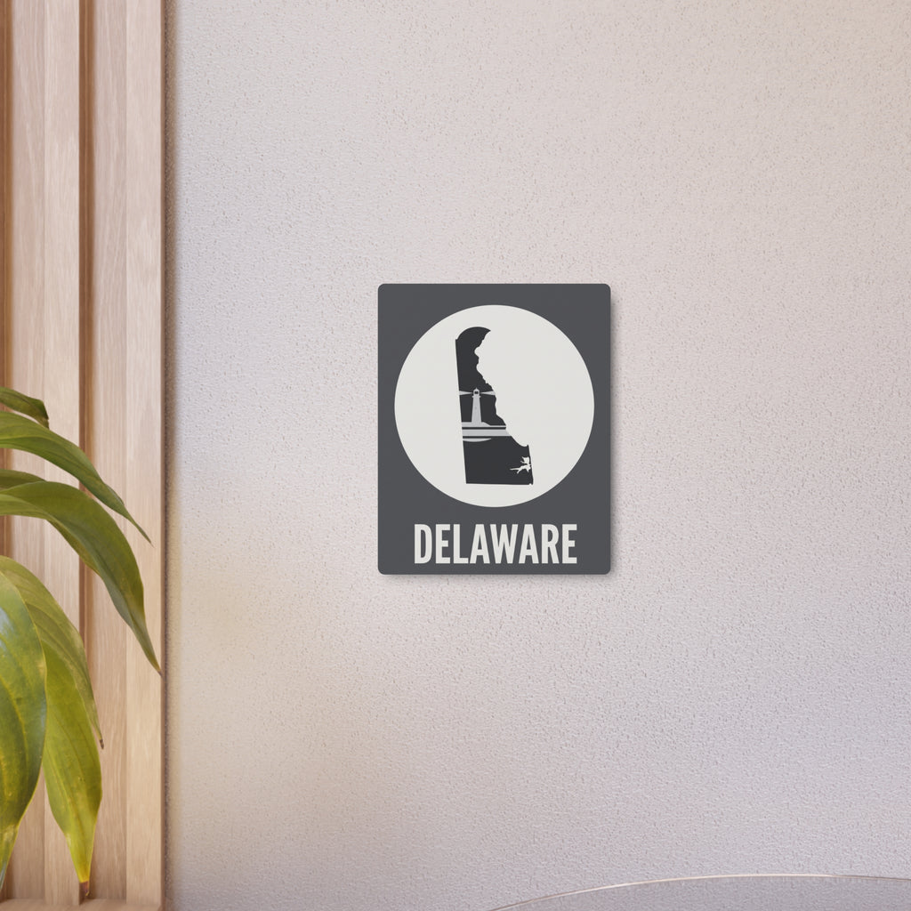 Delaware lighthouse silhouette metal wall sign with circular badge and bold “DELAWARE” lettering