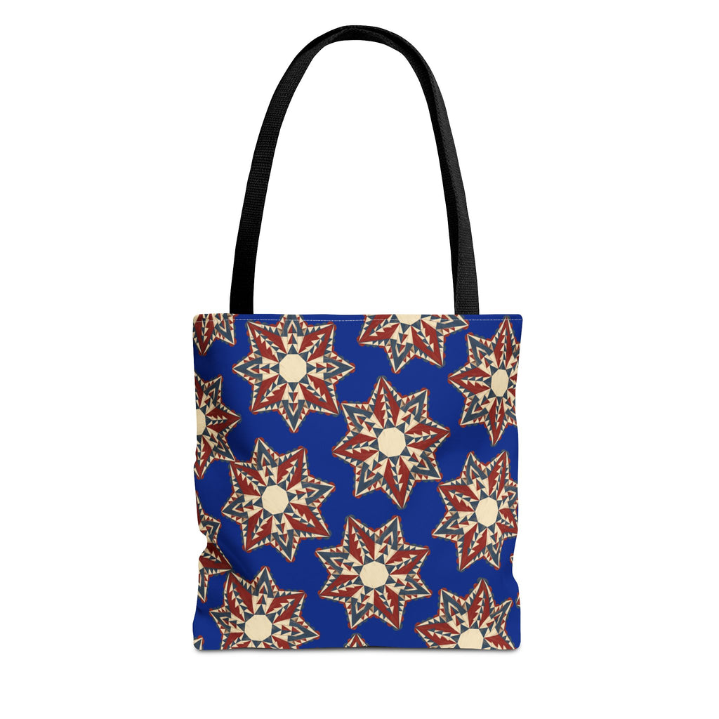 Blue tote bag with starburst floral pattern and black handles