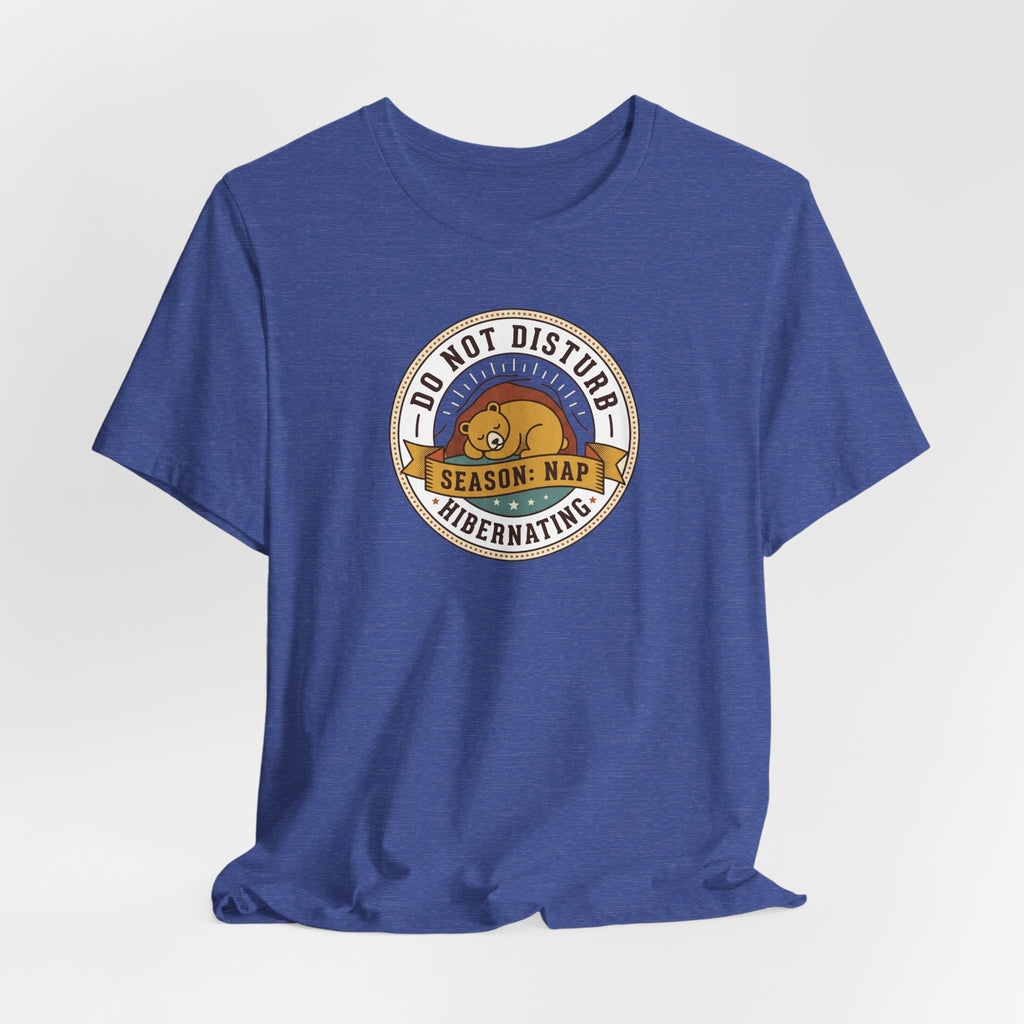 Blue crew-neck T-shirt featuring a circular bear nap graphic on chest.