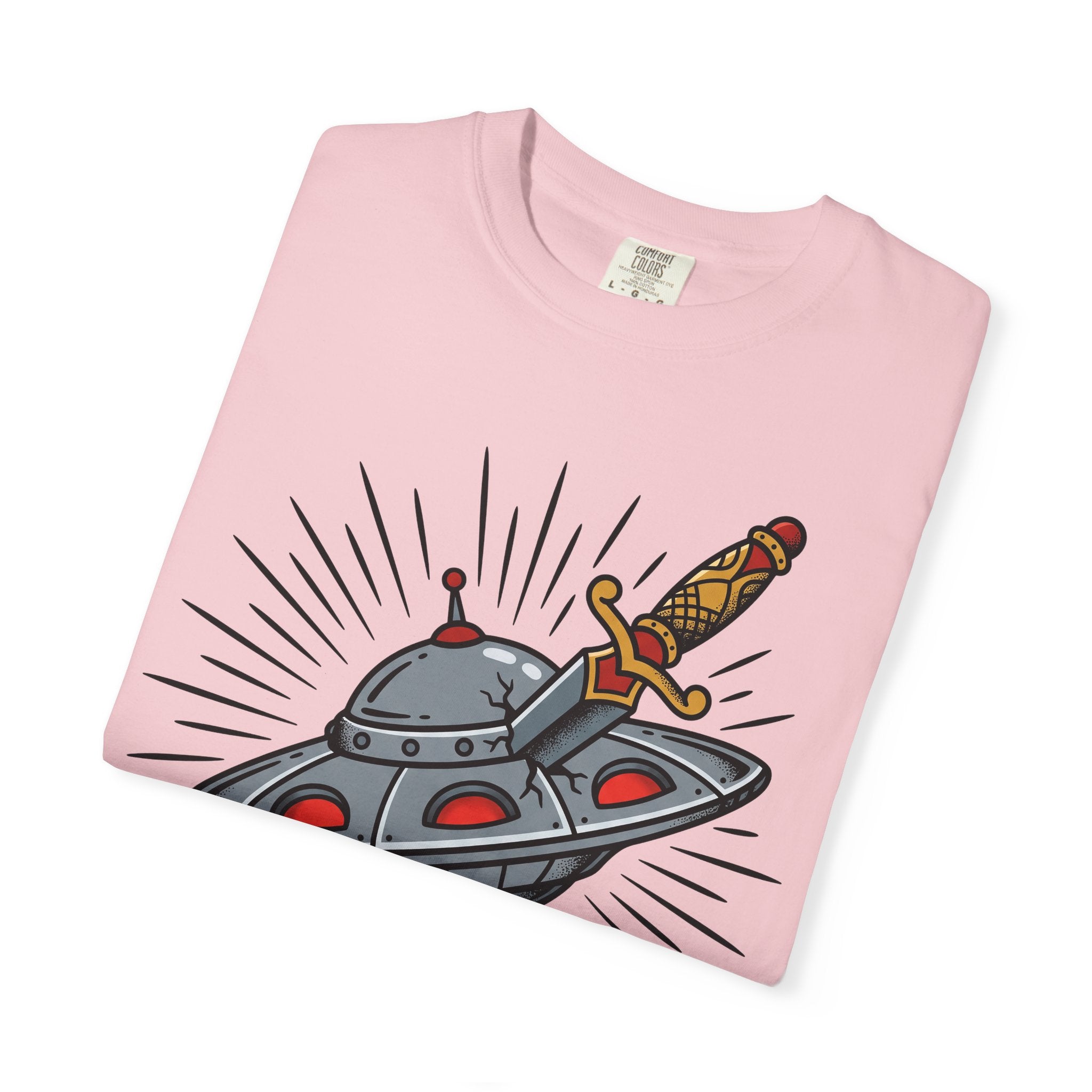 Light pink T-shirt folded flat, front UFO dagger illustration with rays