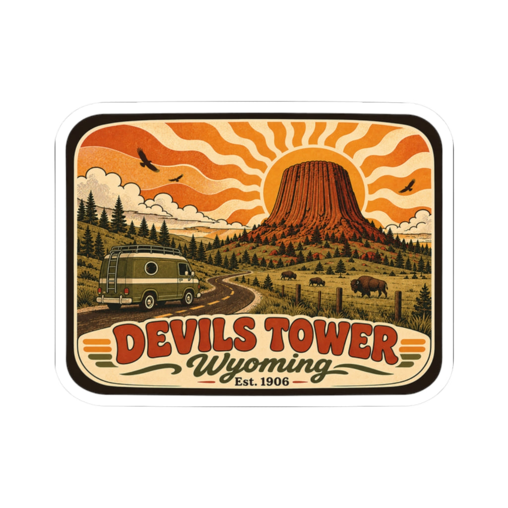 Die-cut Devils Tower Wyoming sticker, orange sunburst rays over the tower and Est. 1906.