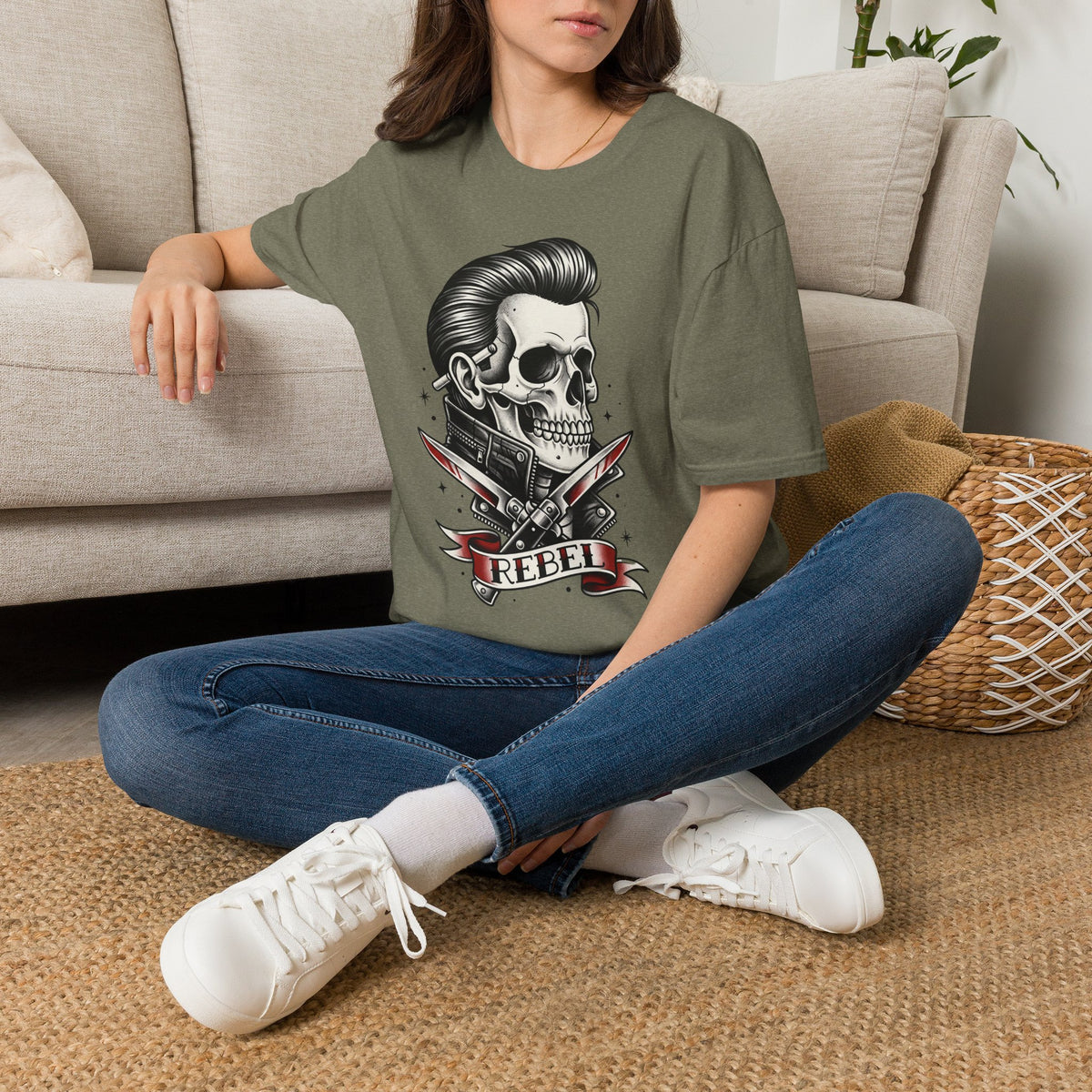 Heather military green unisex T-shirt with skull and knives graphic and “REBEL”