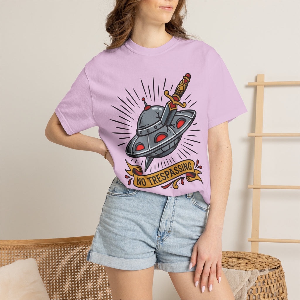 Lavender T-shirt with retro UFO dagger graphic and “NO TRESPASSING” text on front
