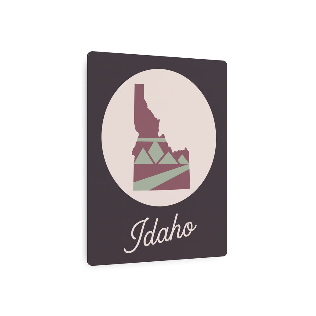 Idaho State silhouette metal wall art featuring mauve outline and sage landscape
