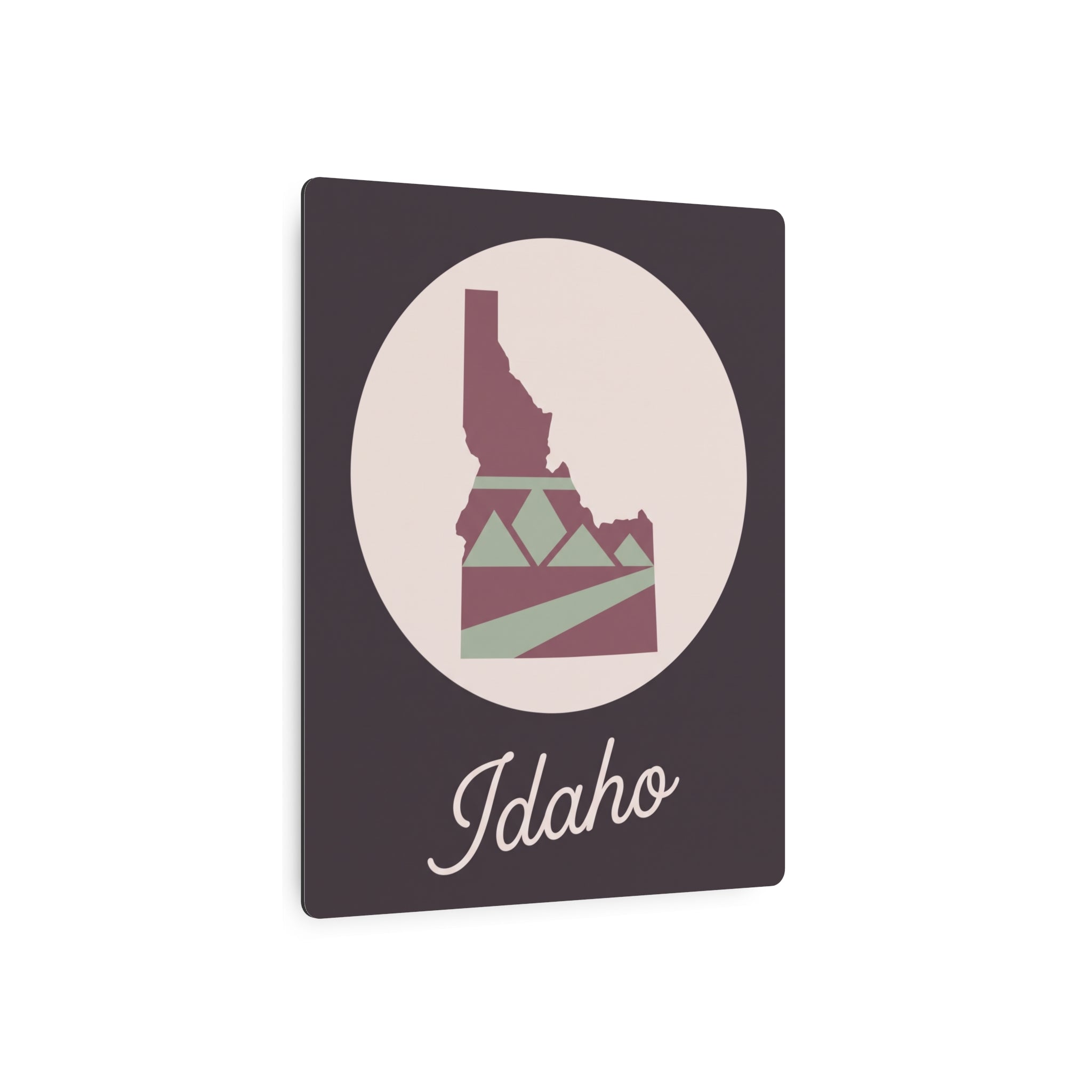 Idaho State silhouette metal wall art featuring mauve outline and sage landscape