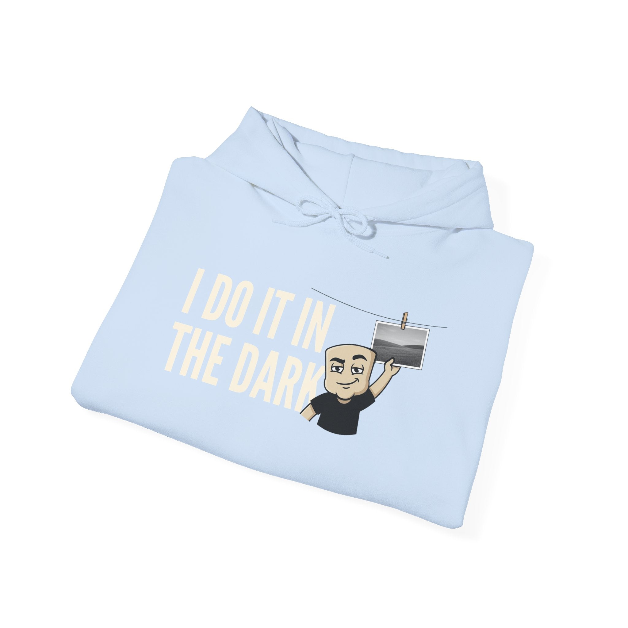 Light blue hoodie with "I Do It In The Dark" graphic and cross icon