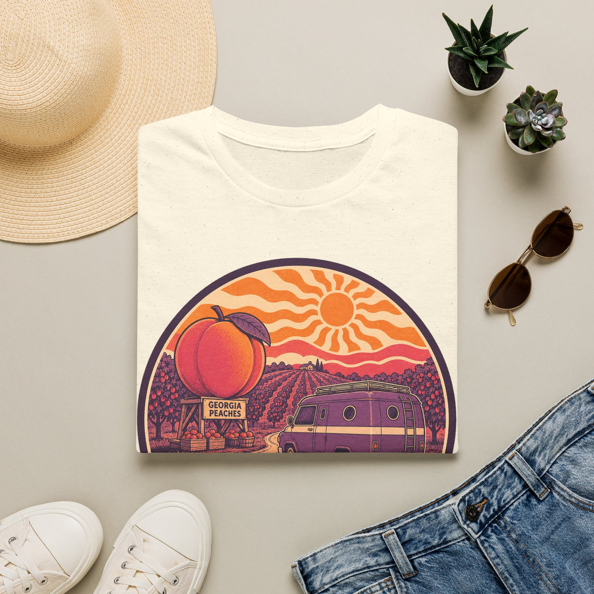 White unisex T-shirt with centered retro peach sunset camper van graphic print.