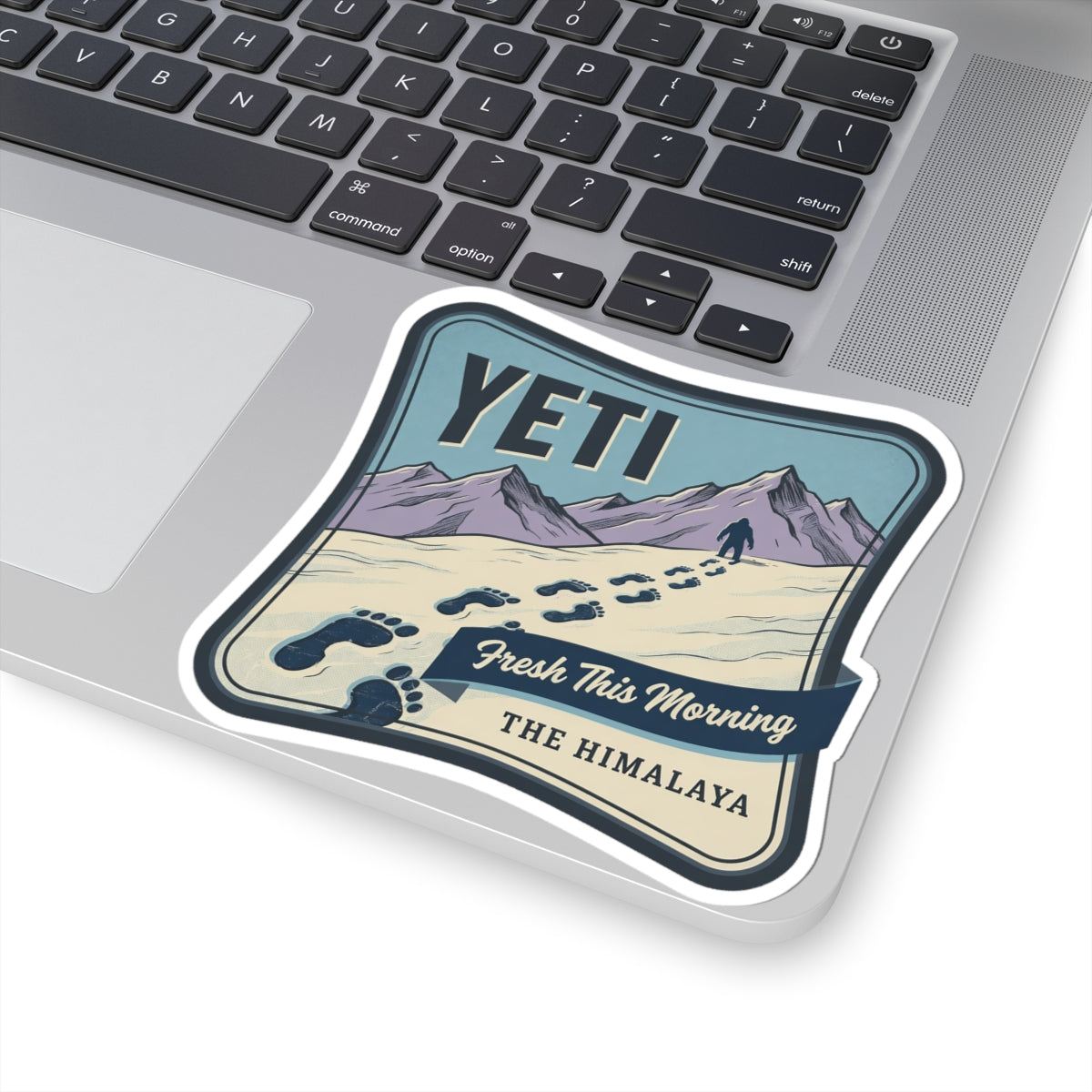 Vinyl decal sticker with YETI logo, paw prints, mountain landscape, and “Fresh This Morning”