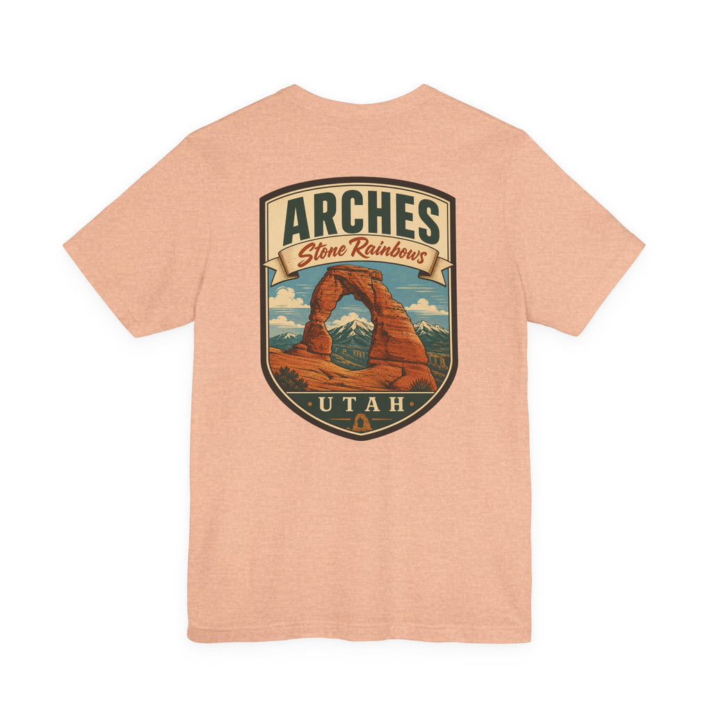 Peach t-shirt with large Arches Utah shield graphic on the chest