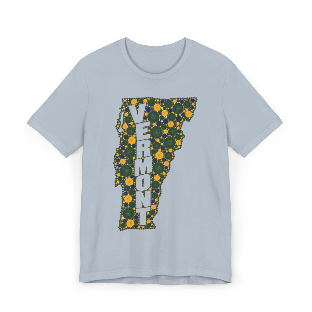 Light blue graphic t-shirt with floral Vermont map outline and vertical "VERMONT" lettering.