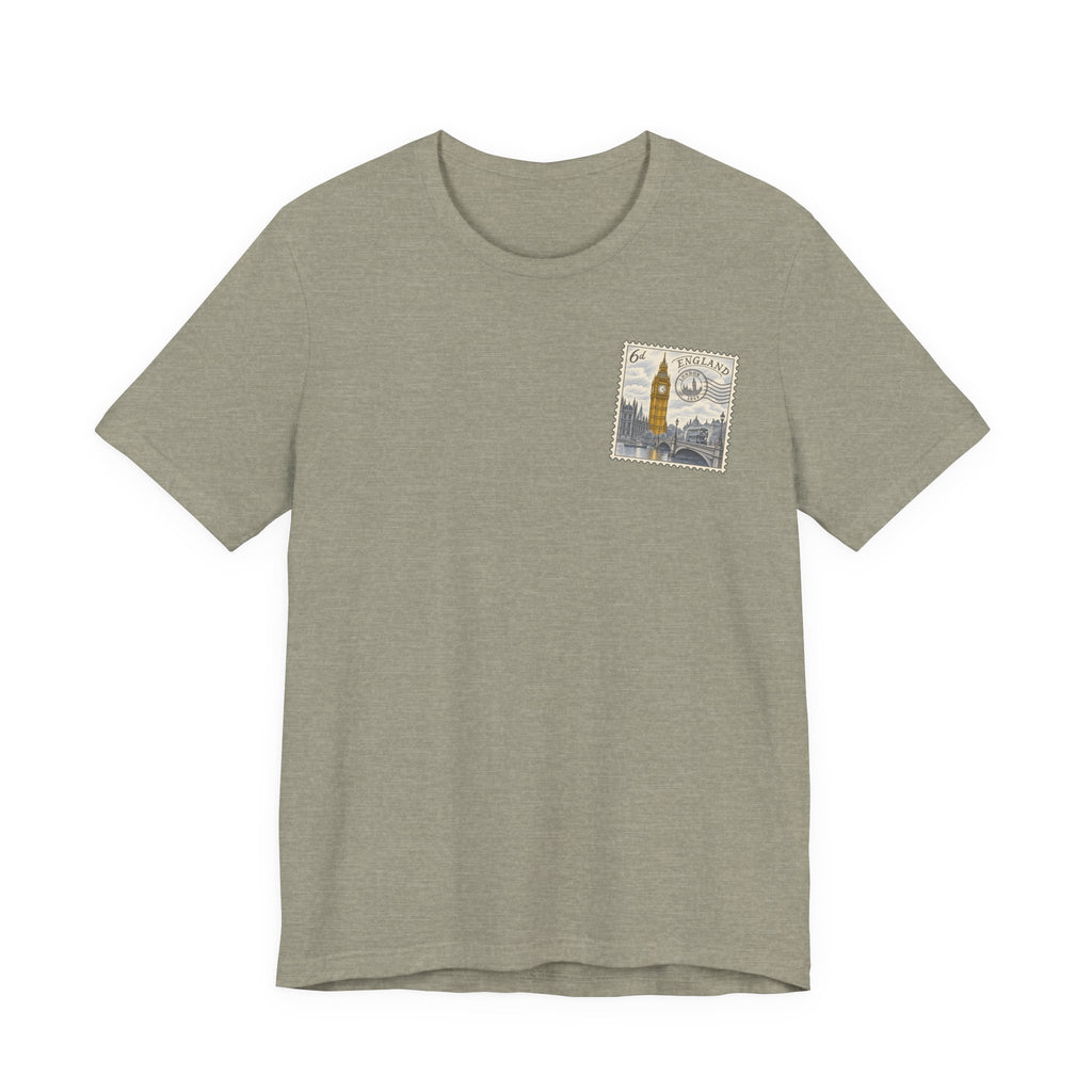 Men's heathered tan travel t-shirt with small vintage postage stamp-style tower graphic