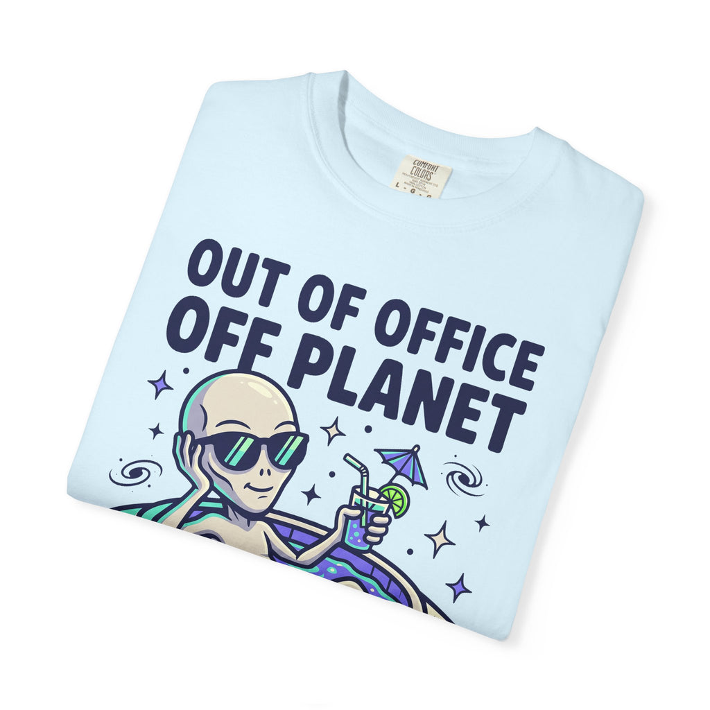 Light blue T-shirt with “Out of Office Off Planet” alien floatie graphic on front