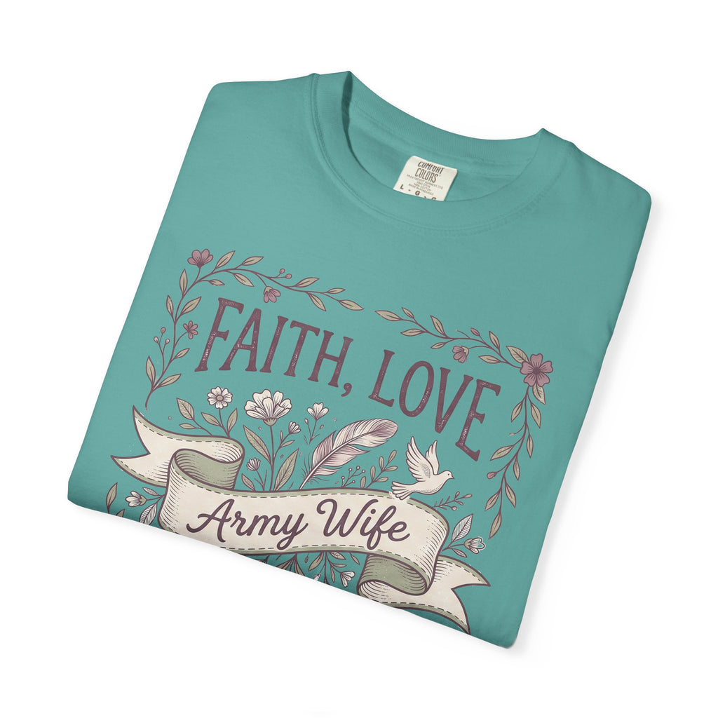 Teal crew-neck T-shirt with floral “FAITH, LOVE” graphic and ribbon “Army Wife”