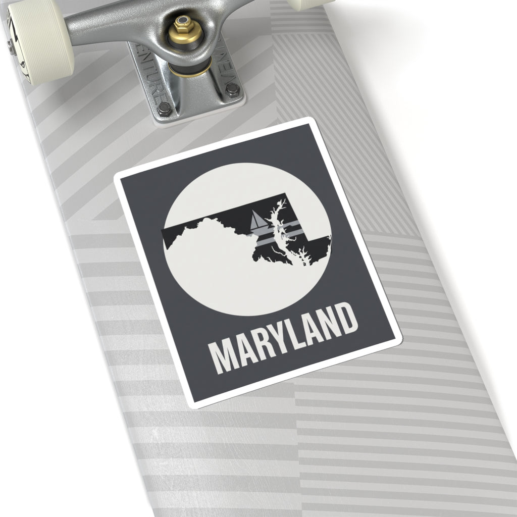 Maryland kiss-cut sticker on a luggage tag, showing circle state silhouette and “MARYLAND”